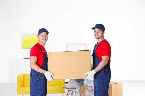 Office removal setup with boxes and equipment in Kennington