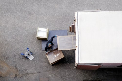 Packed boxes and household items ready for removal in Kennington