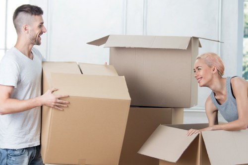 Boxes, files, and IT items organised for business relocation