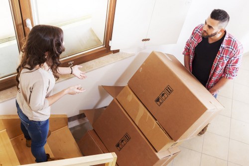 Packed boxes and furniture ready for removal services in Kennington